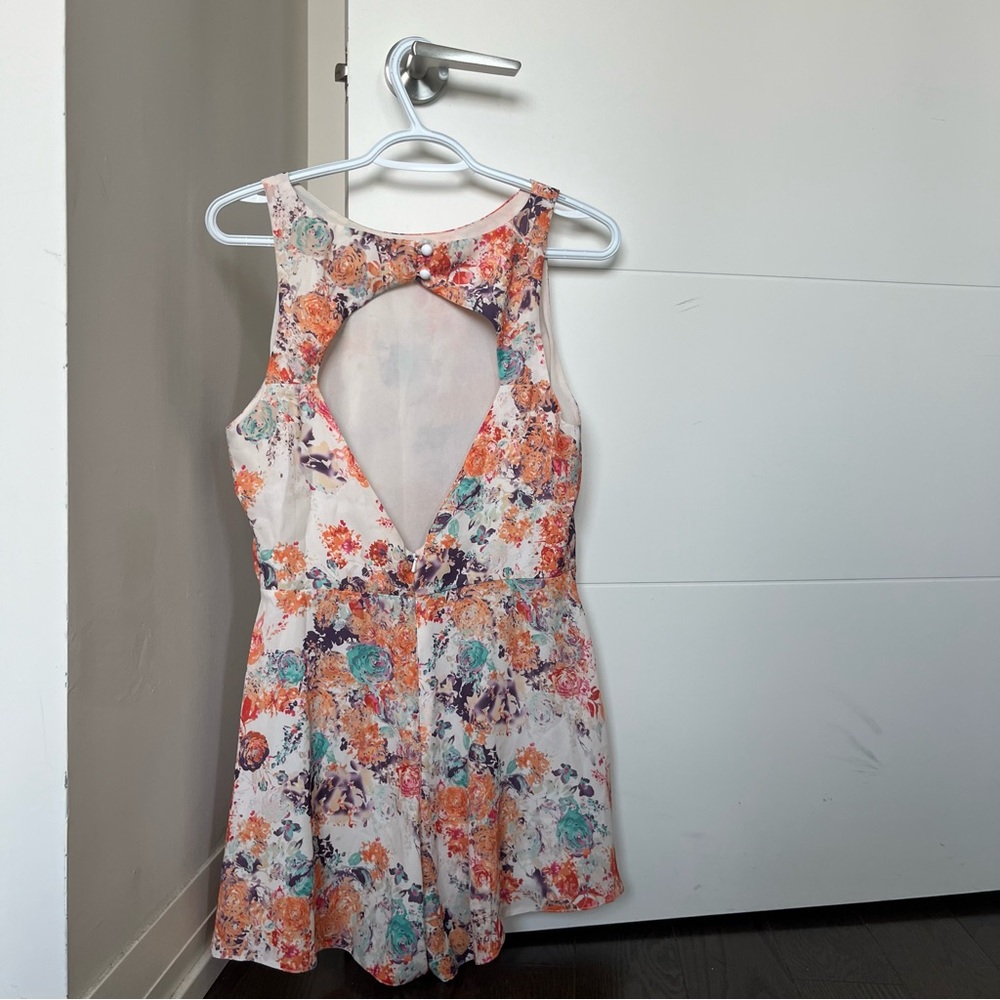 Flower romper with an open back